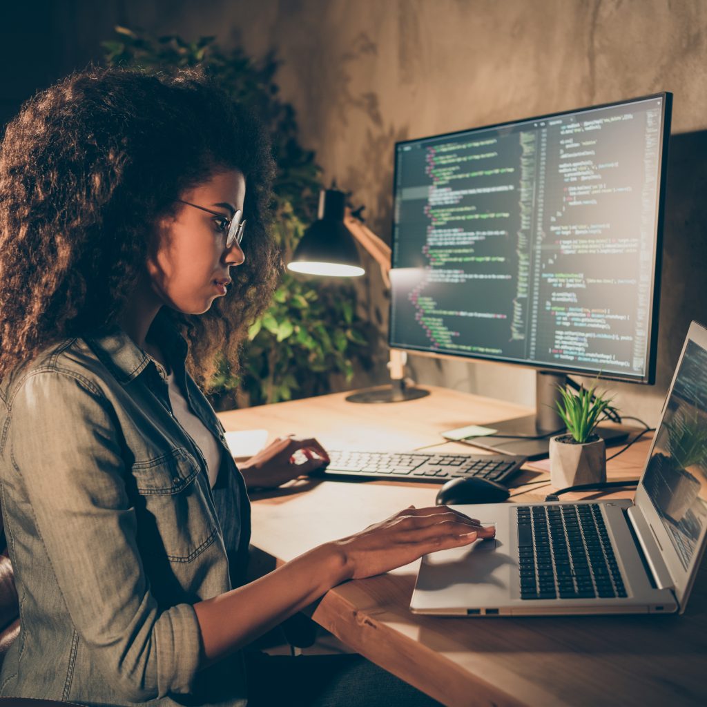 Woman using Notebook & Patch Management